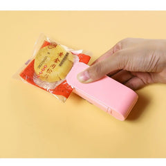 Mini Aparat de Sigilat Pungi cu Baterii, Kadeny, Etansare prin Caldura, Spate Magnetic, Portabil, 9.7x3 cm, Roz