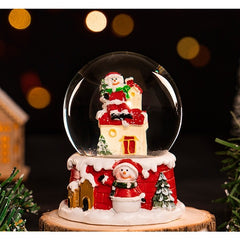 Decoratiune glob cu zapada Kadeny, Mos Craciun pe casa, diametru 4.5 cm, multicolor