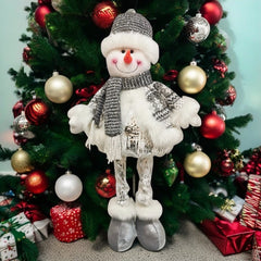 Figurina Decorativa, Pentru Craciun, Kadeny, Om de Zapada, Picioare Telescopice, Inaltime Reglabila 33- 70 cm, Pantaloni Luciosi, Alb/Argintiu