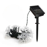 Instalatie Craciun, 5 metri, 20 Becuri LED tip Flori de cires, pentru exterior cu incarcare solara, Alb cald, Kaveny