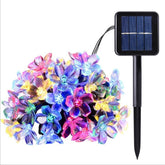 Instalatie Craciun, 5 metri, 20 Becuri LED tip Flori de cires, pentru exterior cu incarcare solara, Multicolor, Kaveny