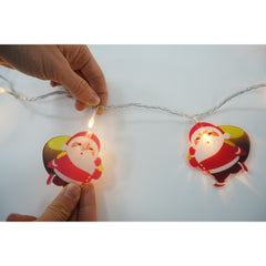 Instalatie Craciun cu ornamente Mos Craciun cu sac, 1 m, 10 LED-uri, Alb Rece, Baterii, Fir Transparent, Kaveny