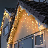 Instalatie Craciun Yoto, Tip Franjuri/Turturi, 4 m, 120 LED-uri, Prelungitor 1.5 m, 8 Jocuri de Lumini, Interconectabila, Conectare la Retea, Fir transparent, Interior/Exterior, Alb Cald