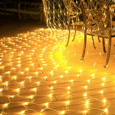 Instalatie Craciun Yoto, Tip Plasa, 1.5 m x 1.5 m, 120 LED-uri, Prelungitor 1.5 m, 8 Jocuri de Lumini, Interconectabila, Fir transparent, Interior/Exterior, Alb Cald