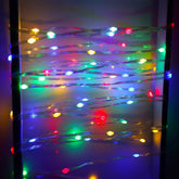 Instalatie de Craciun Kaveny, liniara, cu 200 micro LED-uri, 20 m, 220V, conectare la retea, cu 8 jocuri de lumini, interior/exterior, fir transparent, 3 fire cupru, multicolora