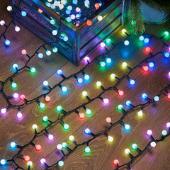 Instalatie de Craciun Liniara RGRB Yoto, 10 m, din care 1 m Prelungitor 220V, 40 LED, Bilute Mate, Interconectabila, Utilizare Interior/Exterior, Fir Negru, multicolor