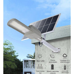 Lampa solara stradala Kaveny, IP65, senzor de lumina, 60 LED-uri SMD, 2250 lm, panou 25W, putere 200W, autonomie 12-16 ore, telecomanda, montare prin fixare, pentru strada sau gradina, finisaj mat, material ABS, 51.5 x 21 x 7.5, gri