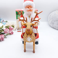 Decoratiune Mos Craciun, Kadeny, Animat, care Canta si Danseaza, cu Saculet, pe Ren, Imbracat Festiv, 28x21x10 cm, Rosu