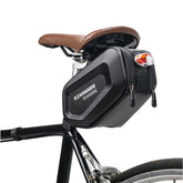 Borseta pentru bicicleta Kaveny, Hard Shell, material piele artificiala si carbon, 20x12x11.5 cm, prindere de sa, capacitate 2L, impermeabila, negru