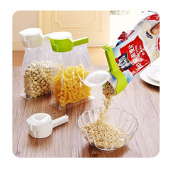 Set 4 cleme cu capac Kaveny, pentru sigilare pungi alimente, material ABS, multicolor