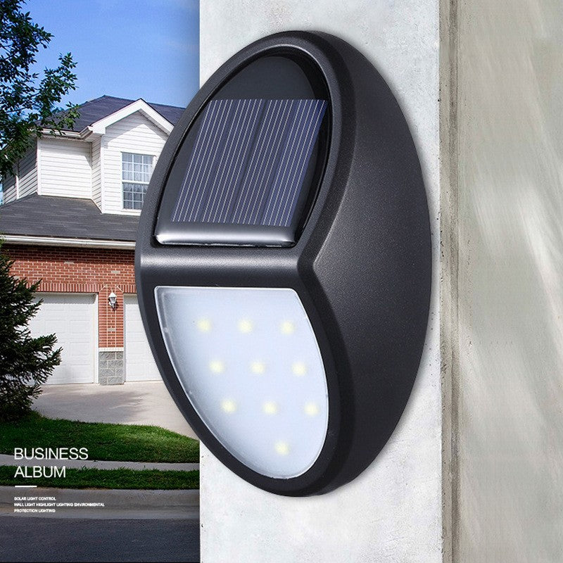 Aplica solara LED pentru perete Kaveny, in forma ovala, 10 LED-uri, lumina puternica, IP65, 12 x 7.5 cm, 1.2 V, 300 mAh, autonomie 8-10 ore, alb rece