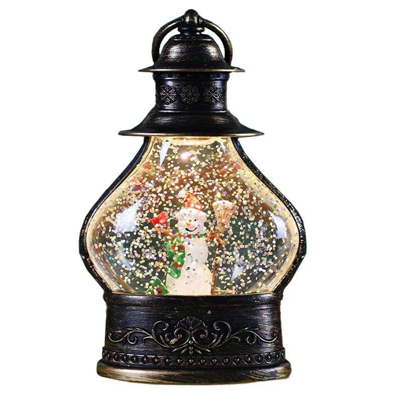 Decoratiune de Craciun tip Felinar, Kadeny, Glob de Cristal cu Fulgi de Zapada, Model Om de Zapada, Ornamentat cu Luminite Interioare, 14.5 x 9 x 3 cm, Rama Neagra, Transparent