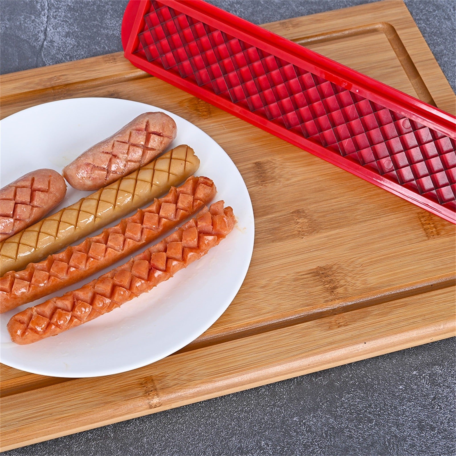 Feliator manual pentru hot-dog Kaveny, crestare carnati si hot-dog, manual, potrivit pentru gratar, 29.5 x 6.5 cm, din inox si ABS, rosu