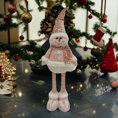 Figurina Decorativa, Pentru Craciun, Kadeny, Om de Zapada, Picioare Telescopice, Inaltime Reglabila 44-54cm, Caciula cu Paiete, Roz