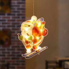 Decoratiune de Craciun pentru fereastra Kaveny, Mos Craciun pe schiuri, cu LED-uri, 15 cm, alb cald
