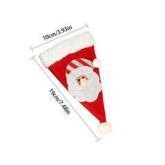 Husa decorativa festiva pentru 3 tacamuri Kaveny, model caciulita cu Mos Craciun, material textil si poliester, 19 x 10 cm, rosu