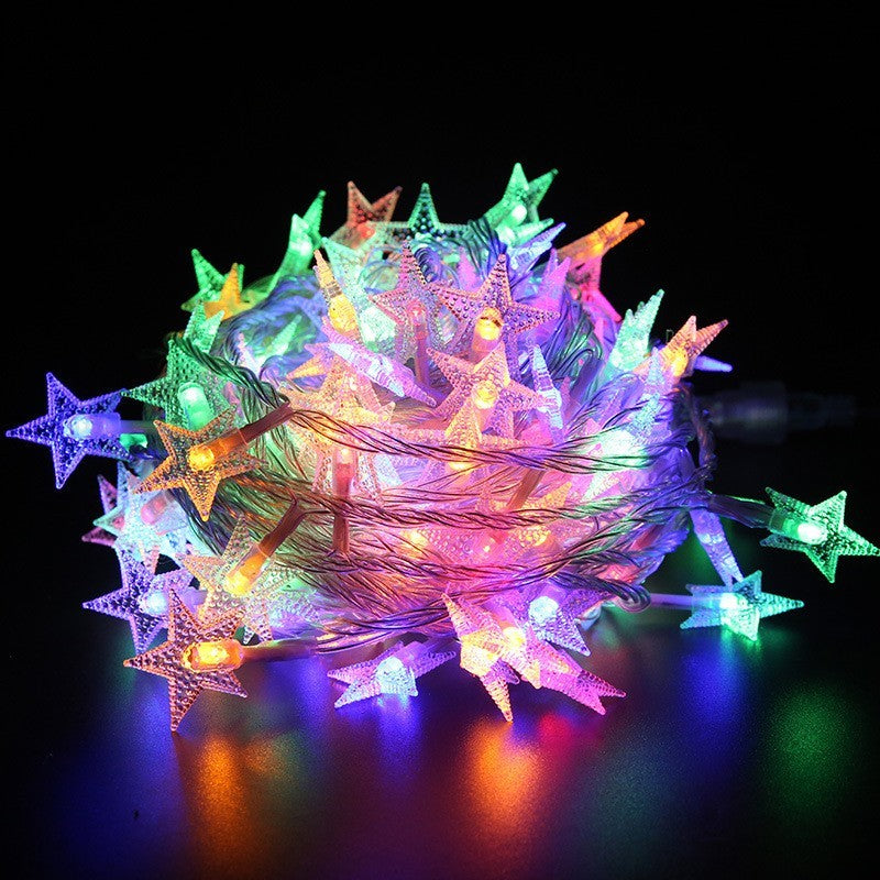 Instalatie Craciun cu baterii, 6 metri, 40 LED-uri tip Stea, fir Transparent, alb cald, Kaveny
