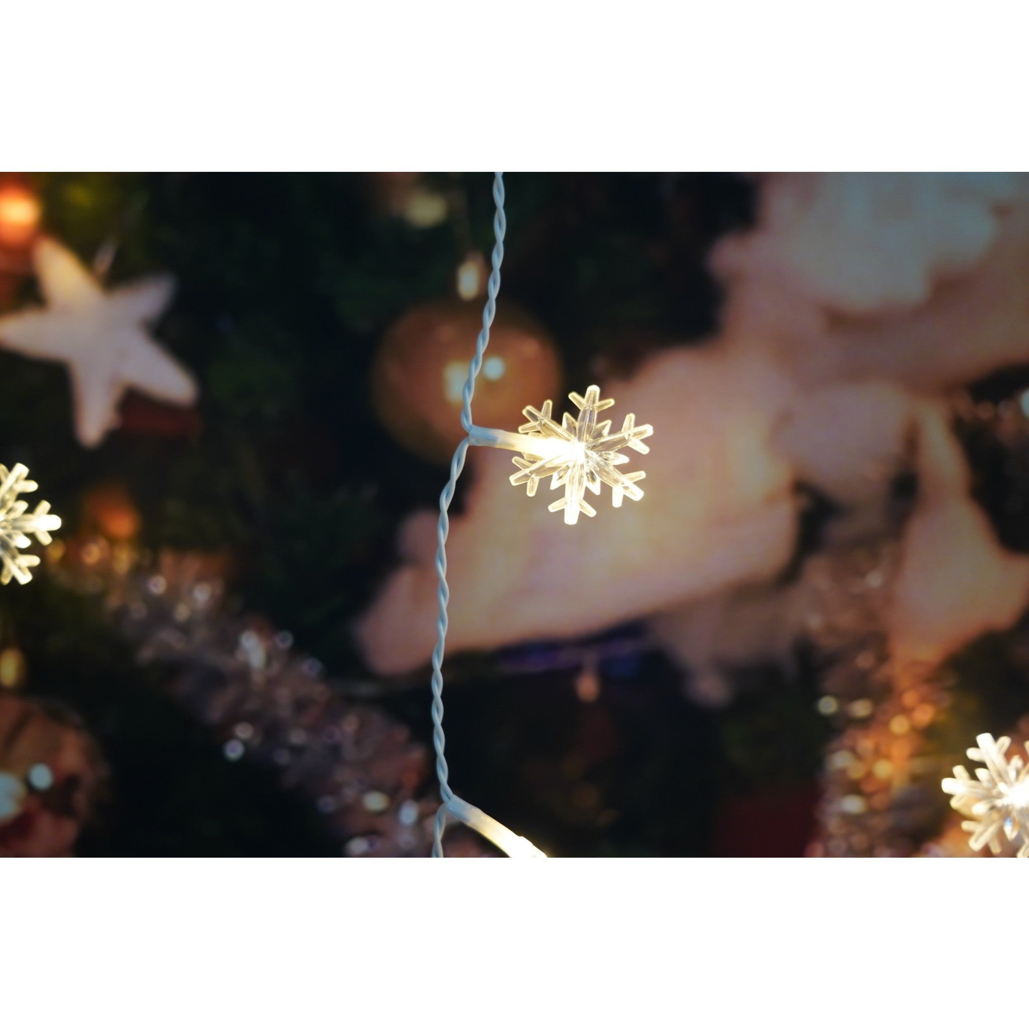 Instalatie Craciun cu ornamente fulgi de zapada, 1 m, 10 LED-uri, Albastru, Baterii, Fir Transparent, Kaveny