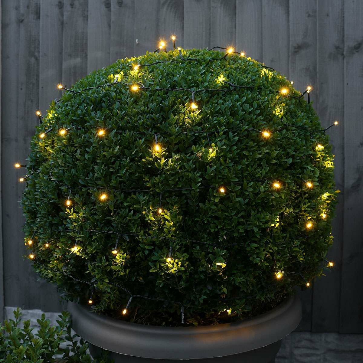 Instalatie Craciun liniara, cu transformator 31V, 10m, alb cald, 100 LED-uri V5, 8 jocuri de lumini, Fir verde, Kaveny