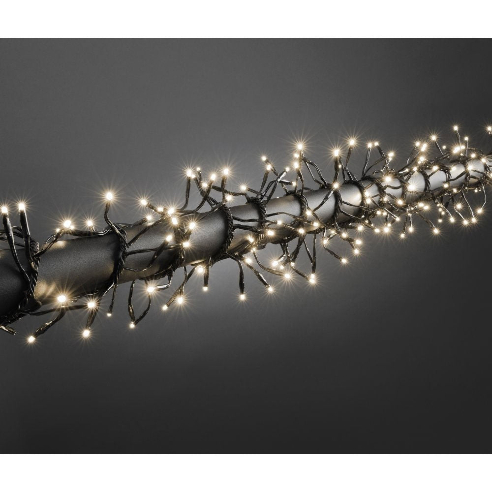 Instalatie Craciun Profesionala de Exterior IP65, 518 m, 5180 Led-uri Mari ,Liniara, Alb cald, Interconectabila, Prelungitor 1.5 m inclus, Fir Negru, Kaveny