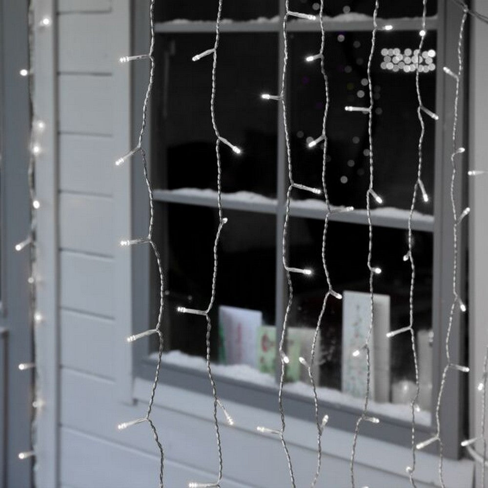 Instalatie Craciun, Tip Perdea, IP44, 10 m x 1 m, 600 LED-uri, Alb rece, 8 jocuri de lumini, Transformator, Interconectabila, Prelungitor 3 m inclus, Fir transparent, Interior/ Exterior, Kaveny
