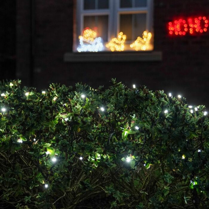 Instalatie de Craciun Liniara Yoto, 22 m, din care 1 m Prelungitor 220V, 300 LED, 8 jocuri de lumini, Controler, Utilizare Interior/Exterior, Fir Negru, Alb Rece