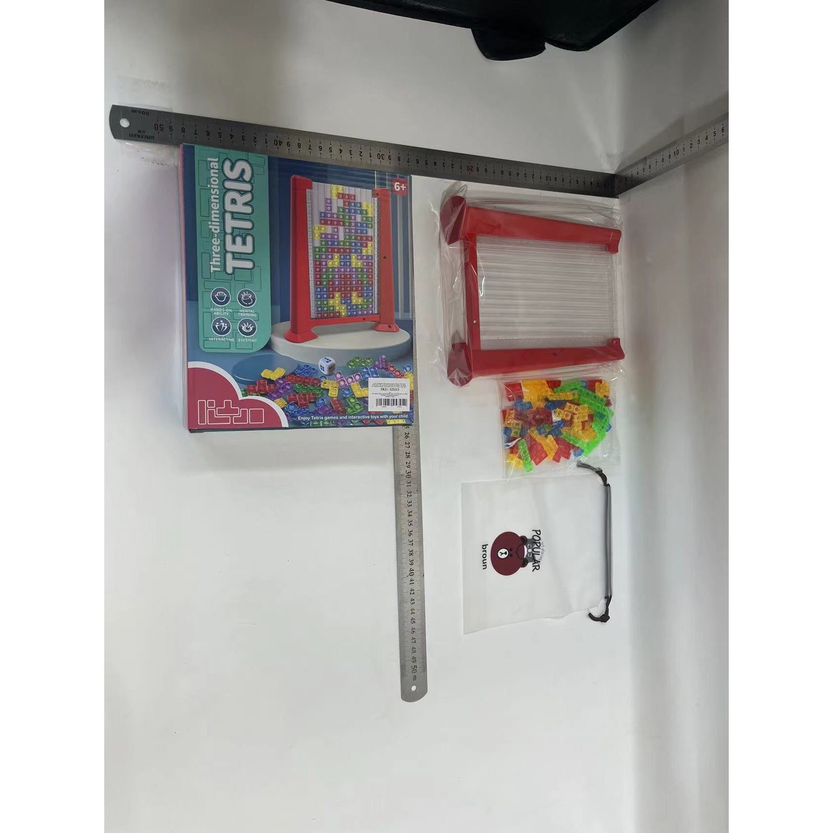 Joc de inteligenta Tetris puzzle tangram Kaveny, 70 de piese multicolore, 3D, montessori, interactiv, din plastic, zar inclus, sac depozitare piese, varsta peste 6 ani, 23 x 19.8 x 5 cm, cadru rosu