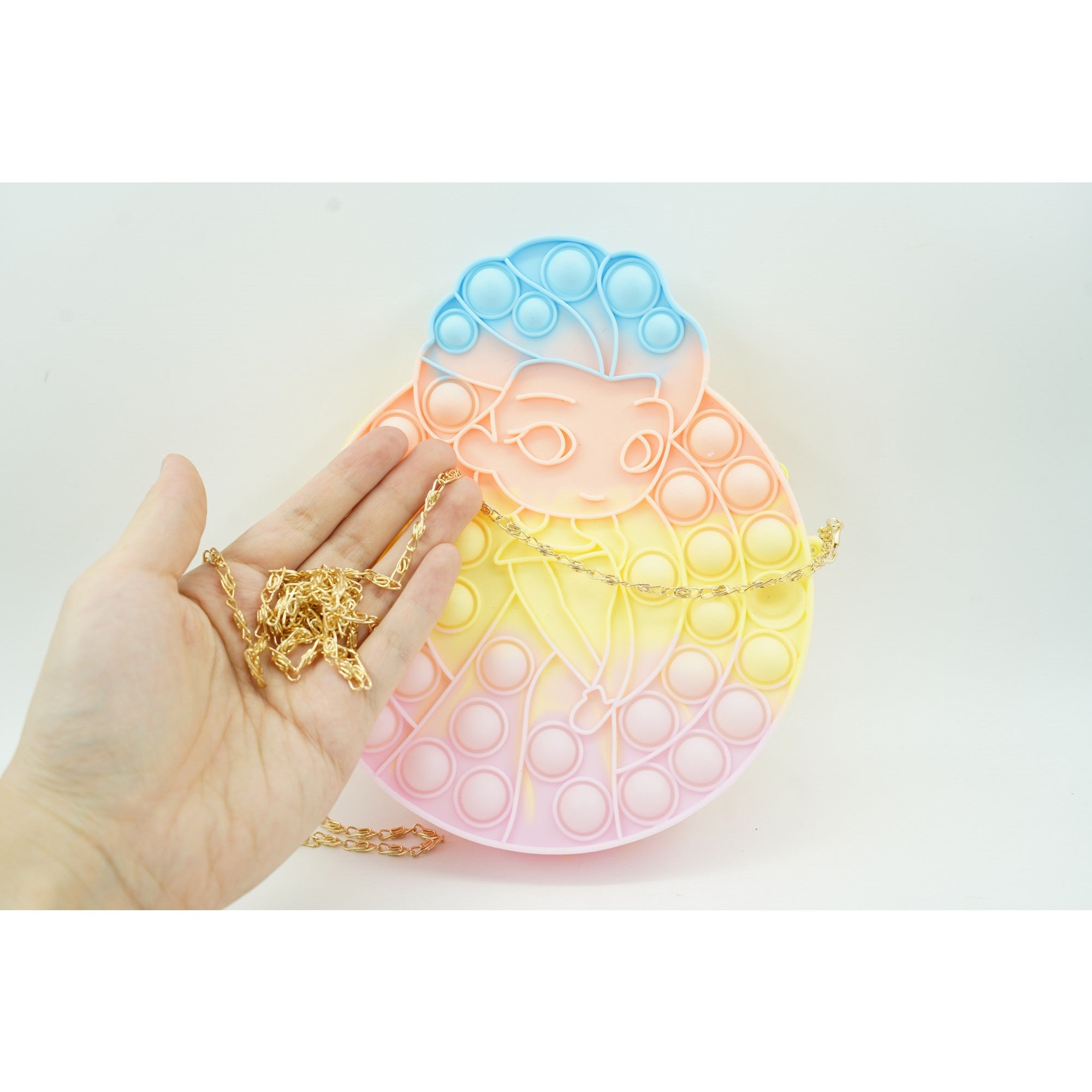 Jucarie antistres din silicon, Kaveny, Pop It Now and Flip It, Geanta de umar, Mica printesa, 16 cm, Macarons