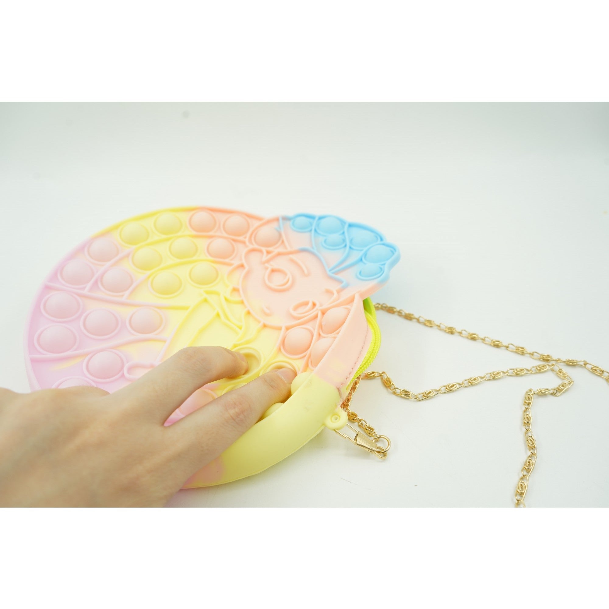 Jucarie antistres din silicon, Kaveny, Pop It Now and Flip It, Geanta de umar, Mica printesa, 16 cm, Macarons