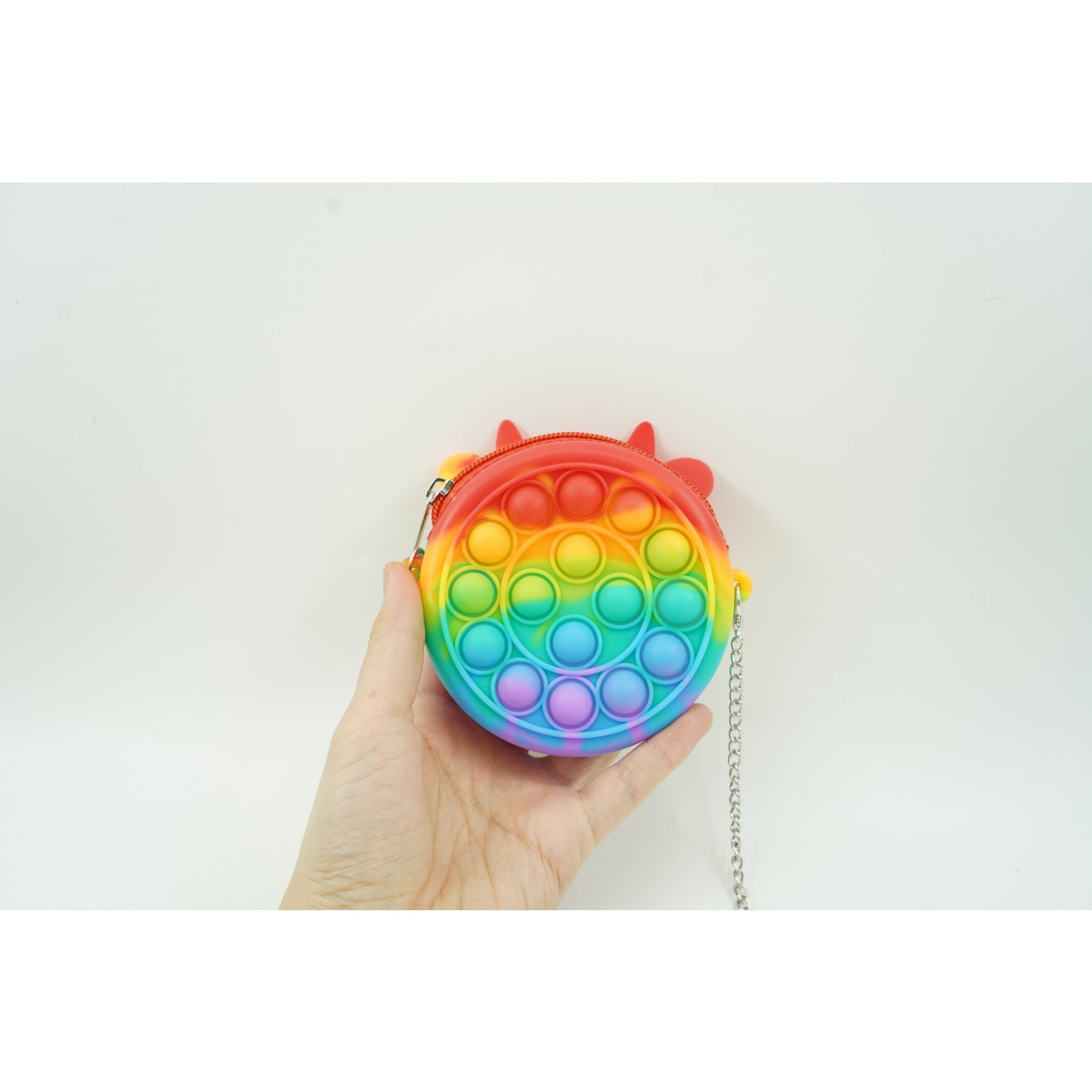 Jucarie antistres din silicon Kaveny, Pop it Now and Flip It ,Mini Geanta, Vacuta, 6 cm, Curcubeu
