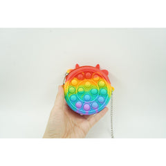 Jucarie antistres din silicon Kaveny, Pop it Now and Flip It ,Mini Geanta, Vacuta, 6 cm, Curcubeu