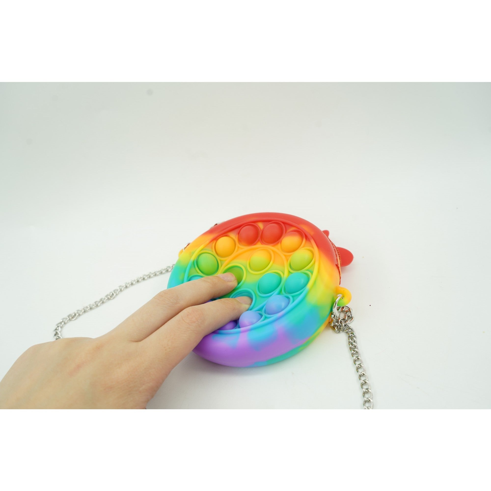 Jucarie antistres din silicon Kaveny, Pop it Now and Flip It ,Mini Geanta, Vacuta, 6 cm, Curcubeu