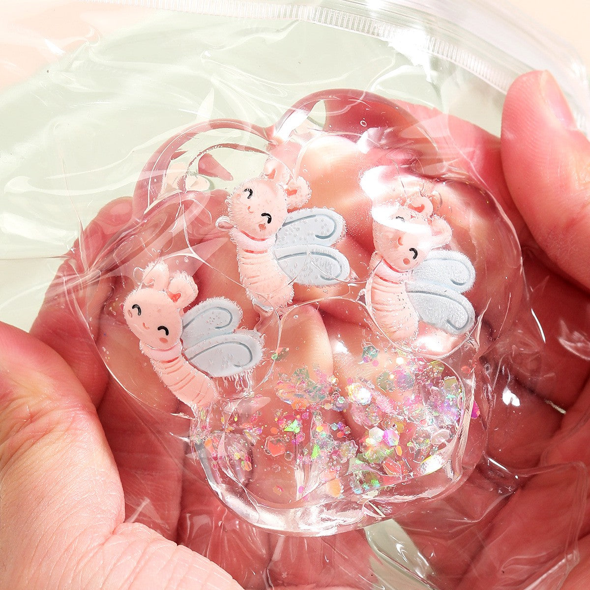 Jucarie Antistres Squishy, Kaveny, cu Revenire Lenta, Squeeze Pinch Family, Model Cat Paw, 6.5 x 7 cm, din Tpr, 4-6 Ani, Model 7 Insecte, Transparent