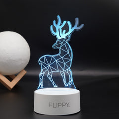 Lampa LED decorativa, Kaveny, 3D, Cerb, cu telecomanda, doua moduri de alimentare USB si baterii, 20 cm inaltime, din material acril si lumina multicolora, alb