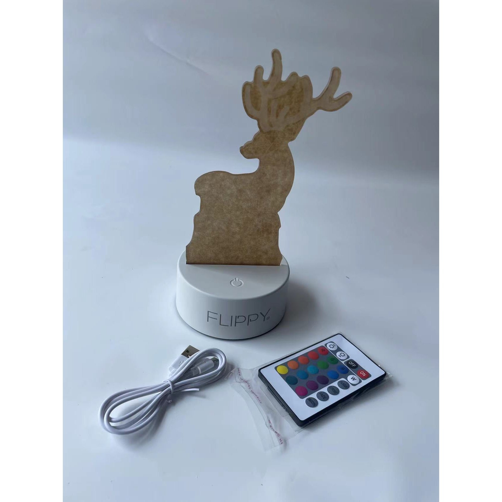 Lampa LED decorativa, Kaveny, 3D, Cerb, cu telecomanda, doua moduri de alimentare USB si baterii, 20 cm inaltime, din material acril si lumina multicolora, alb
