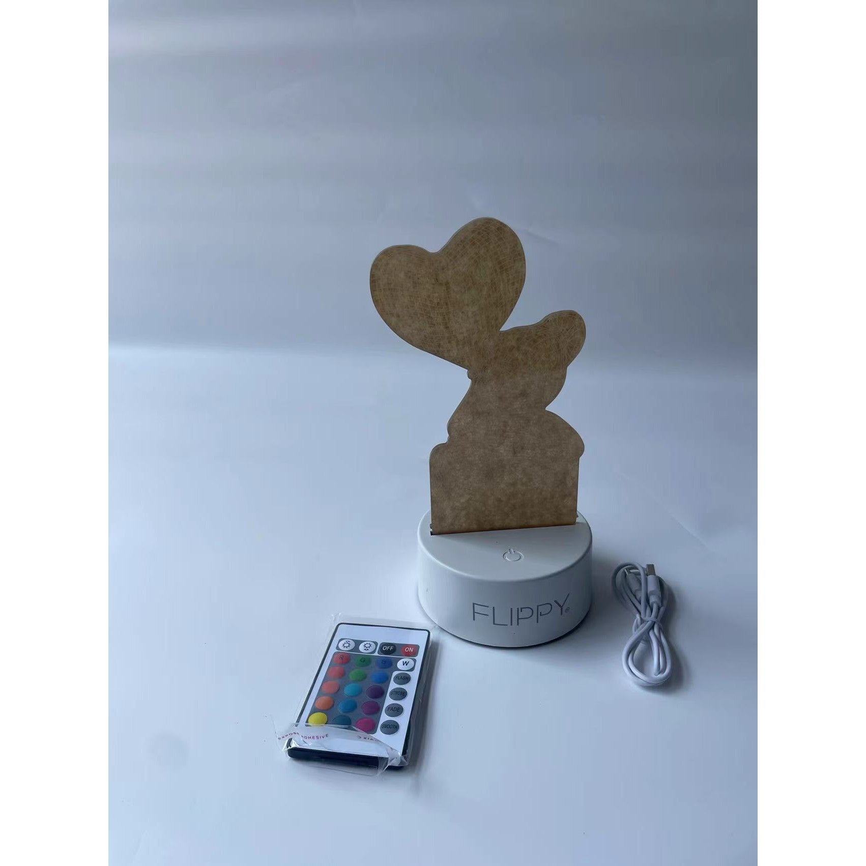 Lampa LED decorativa, Kaveny, 3D, Ursulet cu balon inima, cu telecomanda, doua moduri de alimentare USB si baterii, 20 cm inaltime, din material acril si lumina multicolora, alb