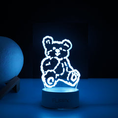 Lampa LED decorativa, Kaveny, 3D, Ursulet, cu telecomanda, doua moduri de alimentare USB si baterii, 20 cm inaltime, din material acril si lumina multicolora, alb