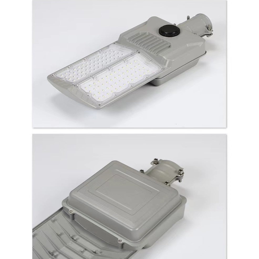 Lampa solara stradala Kaveny, pentru curte sau strada, cu doua grile, finisaj mat, rezistent la apa, montare prin fixare, senzor lumina, baterie de litiu, IP65, lumina rece, putere 500W, autonomie 10 ore, 55 x 23 x 9 cm, gri