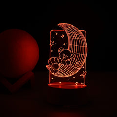 Lampa LED decorativa, Kaveny, 3D, Ursulet si Semiluna, cu telecomanda, doua moduri de alimentare USB si baterii, 20 cm inaltime, din material acril si lumina multicolora, alb