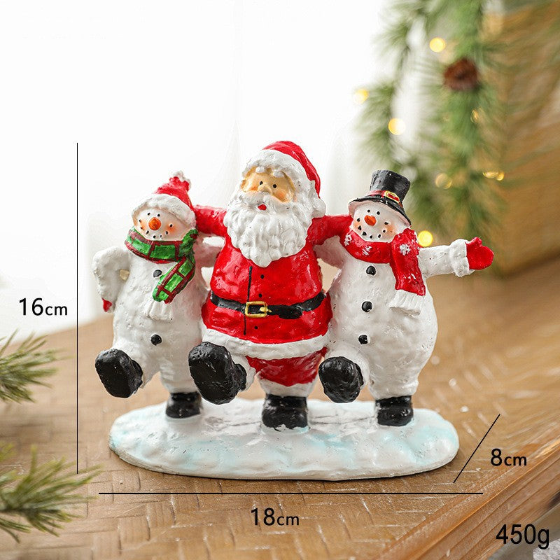 Ornament Decoratiune de Craciun, Kadeny, Decoratiune Mica pentru Craciun din Rasina, Model Mos Craciun cu Oameni de Zapada, 16 x 18 x 8 cm, Rosu Alb