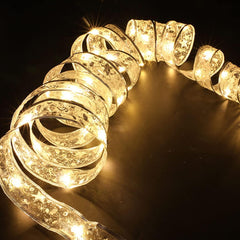 Panglica LED de Craciun Kadeny Aurie, lungime 10 m , 100 LED-uri, Baterii, Alb cald