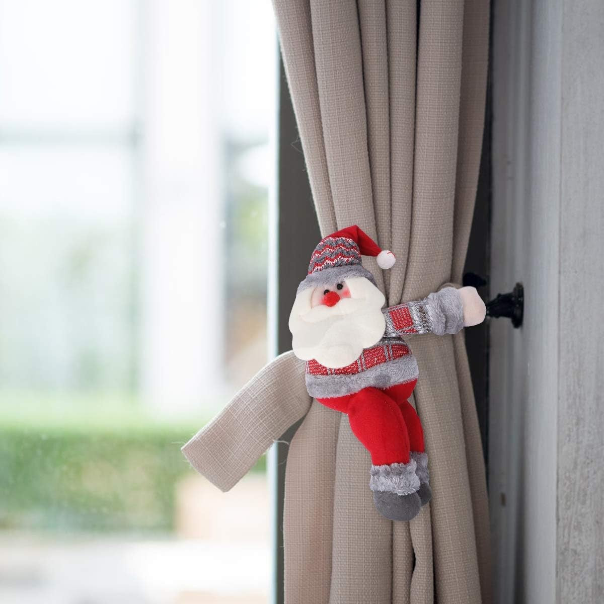 Clema pentru perdea, Kadeny, prindere cu arici, model Mos Craciun pe partea stanga, material textil/poliester, 53 x 23 cm, Multicolor