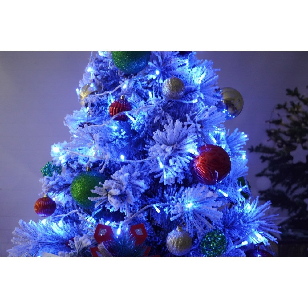 Set brad artificial de Craciun si elemente decorative, nins, decorat cu conuri pin, pentru interior/exterior, inaltime 210 cm, diametru 131 cm, 630 ramuri, Kadeny, alb/verde, suport metalic inclus